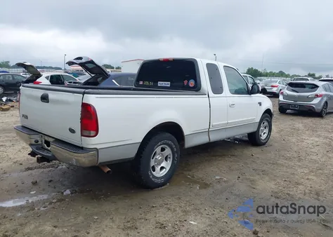 2001 Ford F150 из США, поврежденный, VIN 1FTRX17L61NB83384